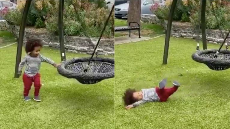 Baby fake falls after touching a swing in viral video