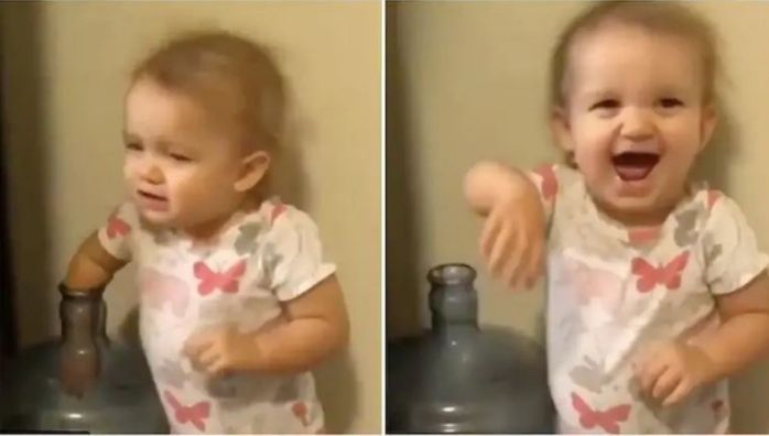 Little girl pranks family by putting hand in water jug