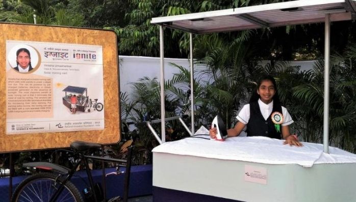 Solar ironing cart by 9th standard student