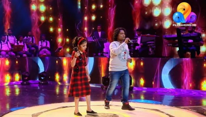 Vipin Xavier and Vaigha singing in Flowers Top Singer