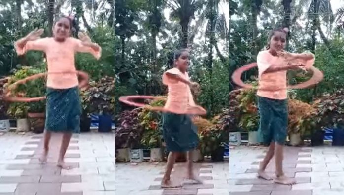 Little girl Hula Hoop while dancing performance