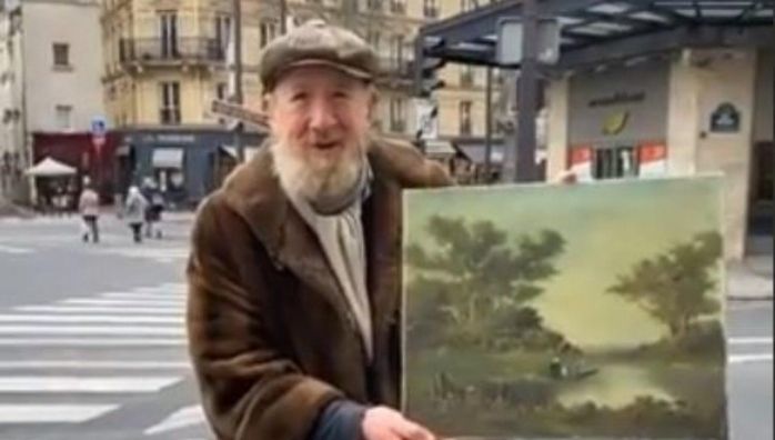 Woman buying painting from an old man
